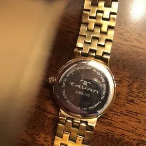 Tauan gold tone band black face Swiss watch Tauan | Accessories | Tauan Gold Tone Band Black Face Swiss  main image 3